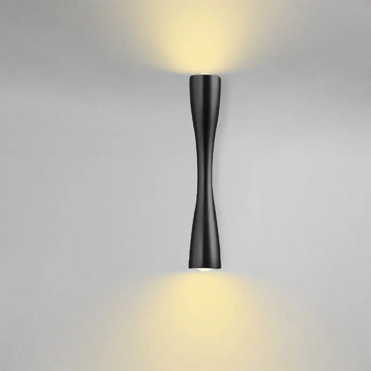 Cylindrical Nordic-style wall sconce in black, white, and gold, photo 2 of 7