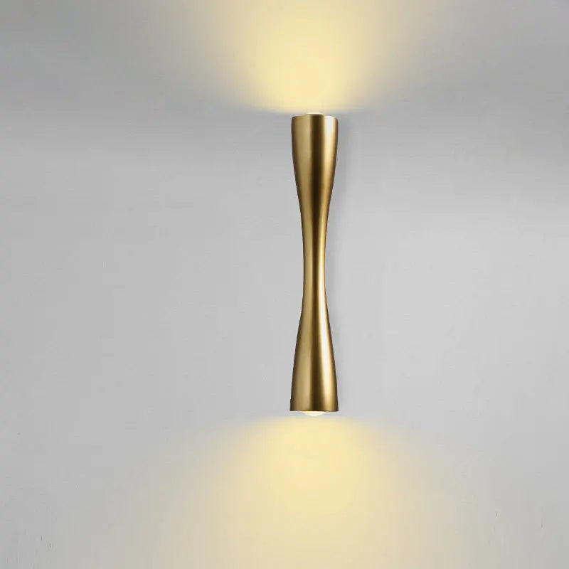Cylindrical Nordic-style wall sconce in black, white, and gold, photo 4 of 7