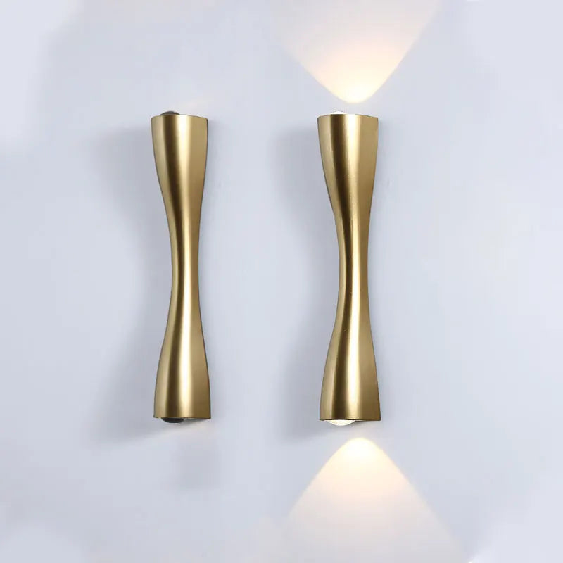 Cylindrical Nordic-style wall sconce in black, white, and gold, photo 5 of 7