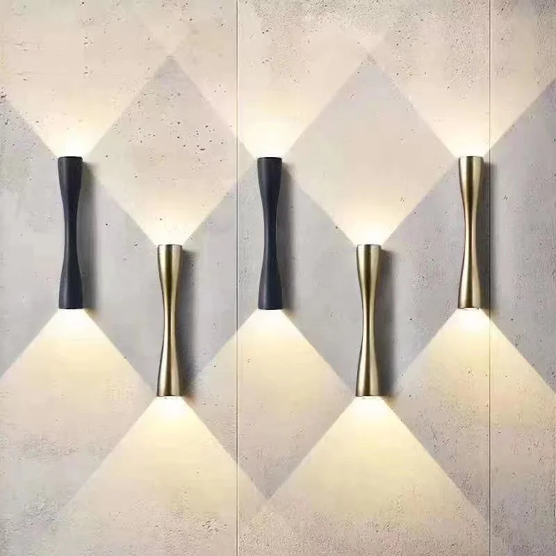 Cylindrical Nordic-style wall sconce in black, white, and gold, photo 6 of 7