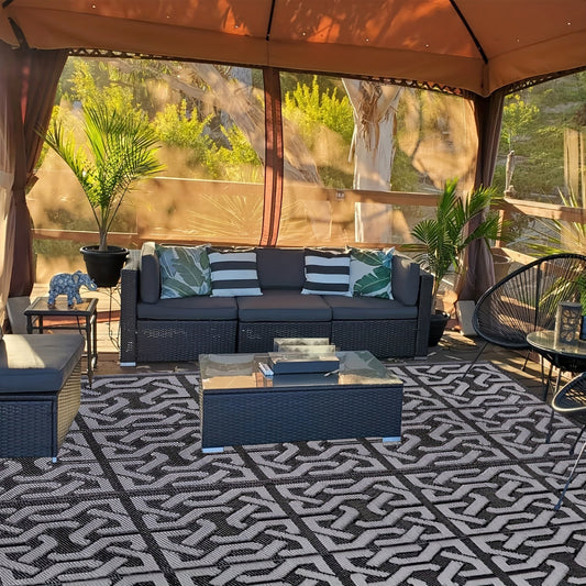 Reversible black and grey patio rug, photo 1 of 8
